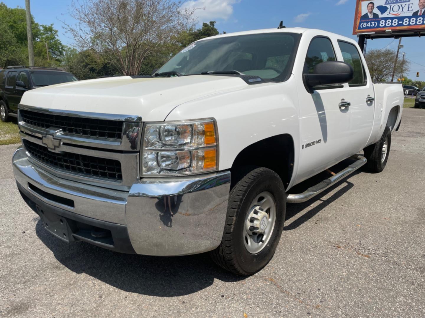 2008 WHITE CHEVROLET SILVERADO 2500H WORK TRUCK (1GCHK23KX8F) with an 6.0L engine, Automatic transmission, located at 5103 Dorchester Rd., Charleston, SC, 29418-5607, (843) 767-1122, 36.245171, -115.228050 - Well Maintained, Local Trade-in with CD/AUX/AM/FM, Cold Cold A/C, Easy-clean Vinyl Floor, Keyless Entry, Tow Package, Clean CarFax (no accidents reported!), Certified One Owner!! 171k miles Located at New Life Auto Sales! 2023 WINNER for Post & Courier's Charleston's Choice Pre-owned Car Dealer AND - Photo#2